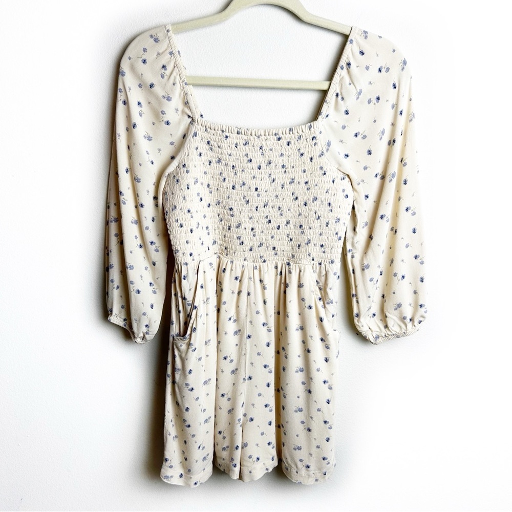 American Eagle off-the-shoulder creme floral romper with pockets size: XS
